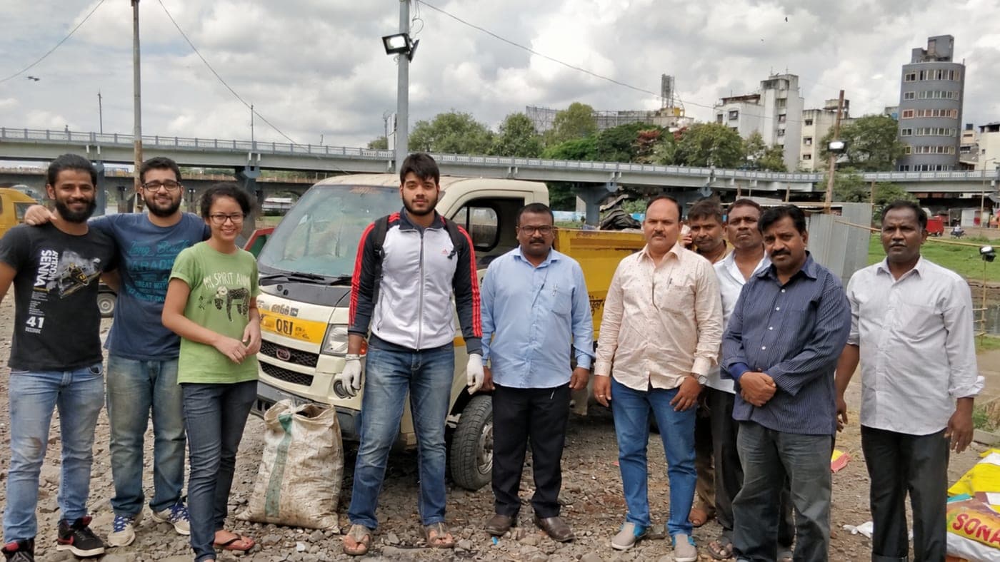 Gaurav with fellow volunteers and officials at an EFI clean-up drive in Pune